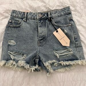 Brand new Jean shorts with rips